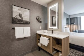 Rainfall showerhead, hair dryer, bathrobes, towels - Sandman Signature Winnipeg Airport Hotel & Suites (Winnipeg)