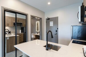 Grand Suite, 1 King Bed with Sofa bed, Kitchen | Private kitchen | Coffee/tea maker