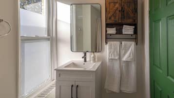 Hair dryer, towels, soap, shampoo