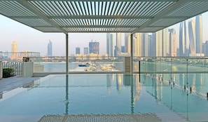Outdoor pool - bnbme | Marina Vista Tower | 1 BDR (Dubai)