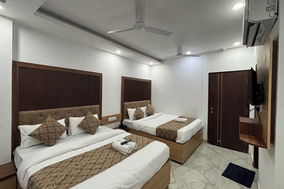 Premium bedding, down duvets, minibar, laptop workspace