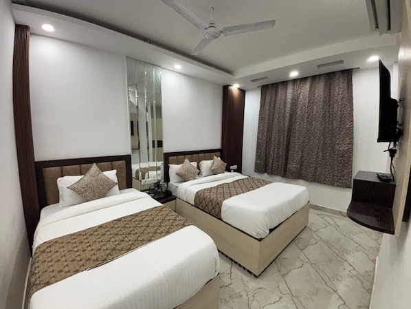 Ropa de cama de alta calidad, edredón y minibar 