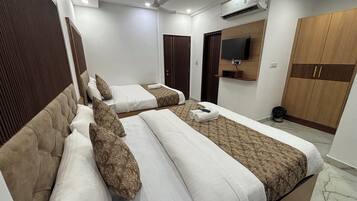 Roupas de cama premium, edredons de pluma, frigobar