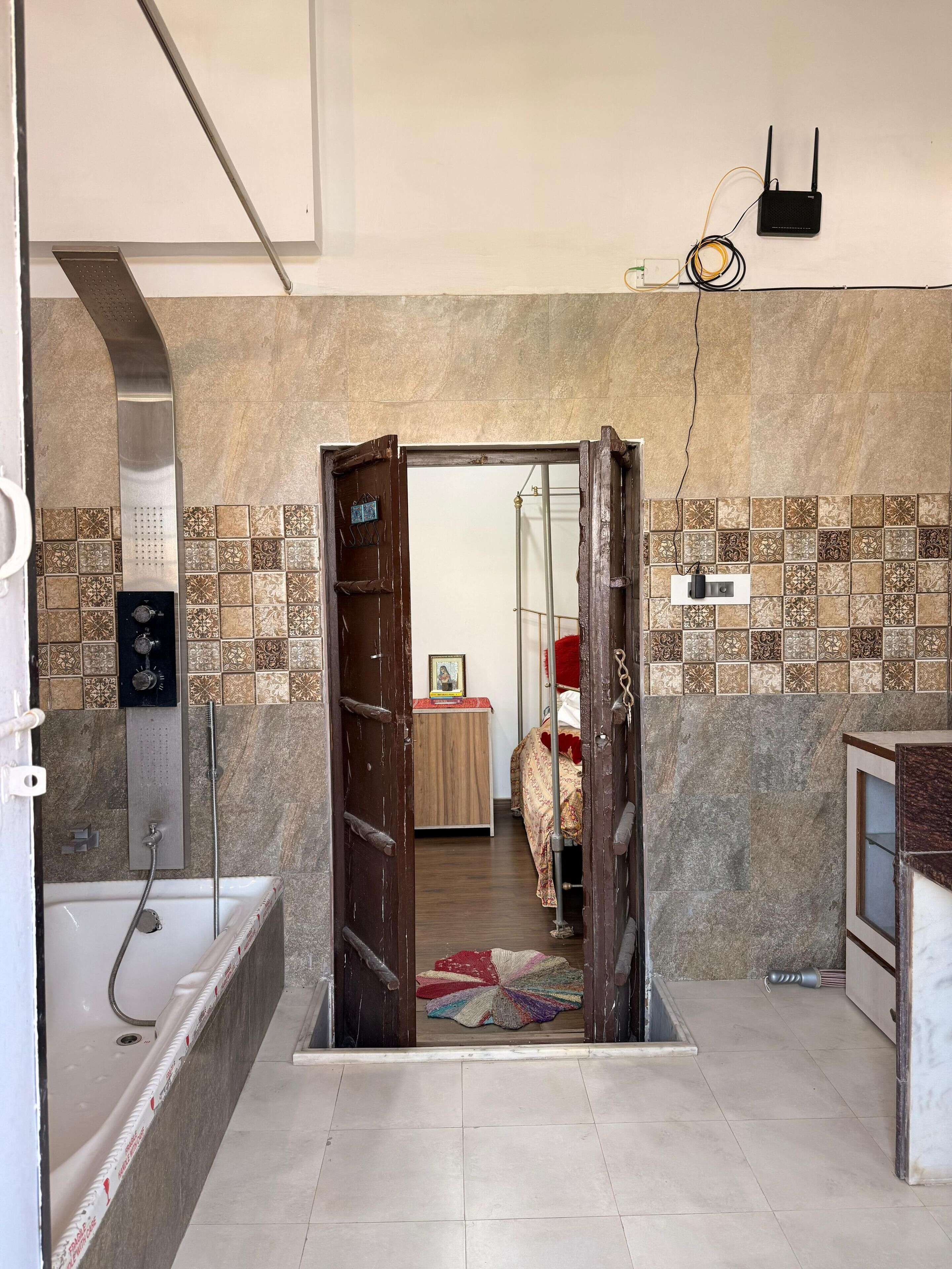 Shower, eco-friendly toiletries, hair dryer, towels