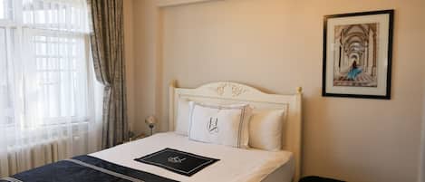 Comfort Room | Premium bedding, free WiFi, bed sheets