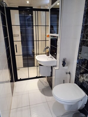 Standard Double Room, Sea View | Bathroom | Shower, hair dryer, slippers, towels