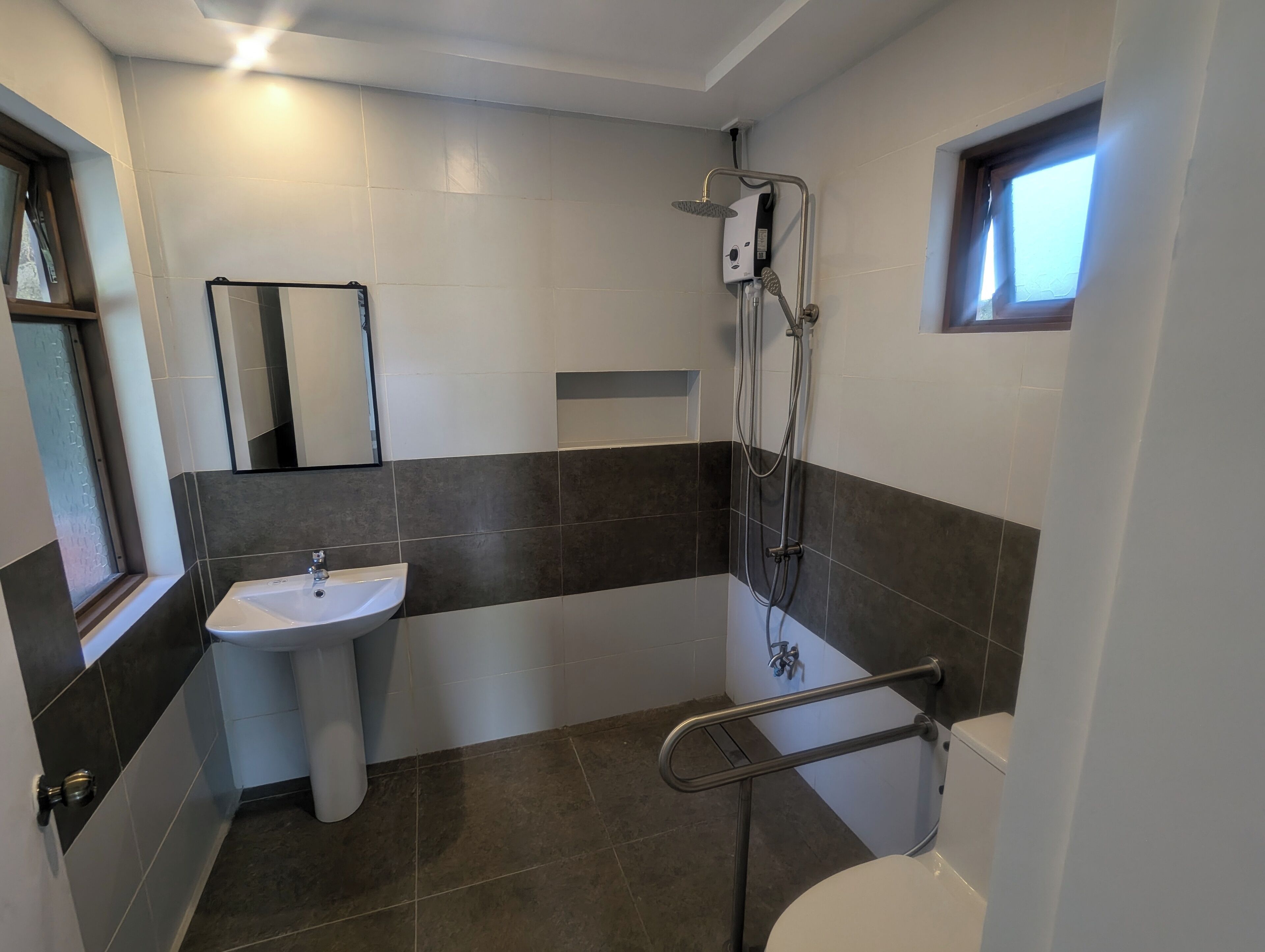 Shower, free toiletries, slippers, towels