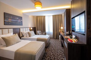 Superior Room with Twin Bed | Roupas de cama premium, frigobar, cofres nos quartos, cortinas blackout