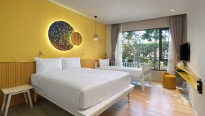 A modern hotel room with a large bed, bedside tables, a TV, and a balcony with a view. - Riva Vibe Hotel Bangkok by PCL (Bangkok)