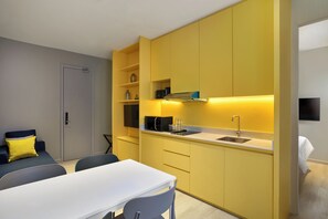 Vibe Suite 2 Bedrooms | Living area | 42-inch Smart TV with cable channels - Riva Vibe Hotel Bangkok by PCL (Bangkok)