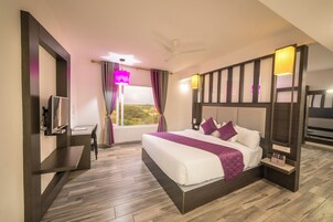 Suite | Premium bedding, desk, laptop workspace, soundproofing