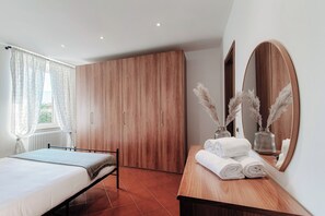 Departamento, 2 habitaciones | 2 habitaciones, edredón, tabla de planchar con plancha y wifi gratis