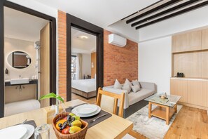 Deluxe Suite | Living area | Flat-screen TV - Atithi Suites  (Pokhara)