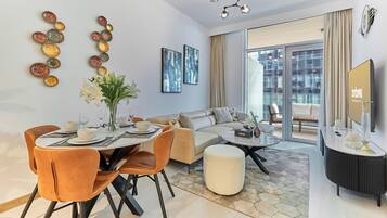 Standard Apartment, 1 Bedroom, Balcony | Living area | Flat-screen TV, pay films, streaming services