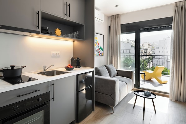 Appartement, terrasse | Cuisine privée | Réfrigérateur, four, plaque de cuisson
