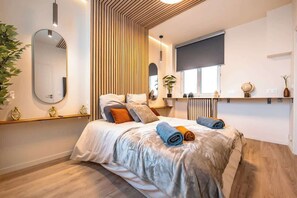 1 slaapkamer, een strijkplank/strijkijzer, wifi, beddengoed