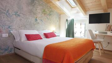 Standaard kamer | Donsdekens, een minibar, een kluis op de kamer, individueel gemeubileerd