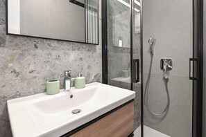 Apartment, 2 Bedrooms, Balcony | Bathroom | Shower, hair dryer, towels, soap