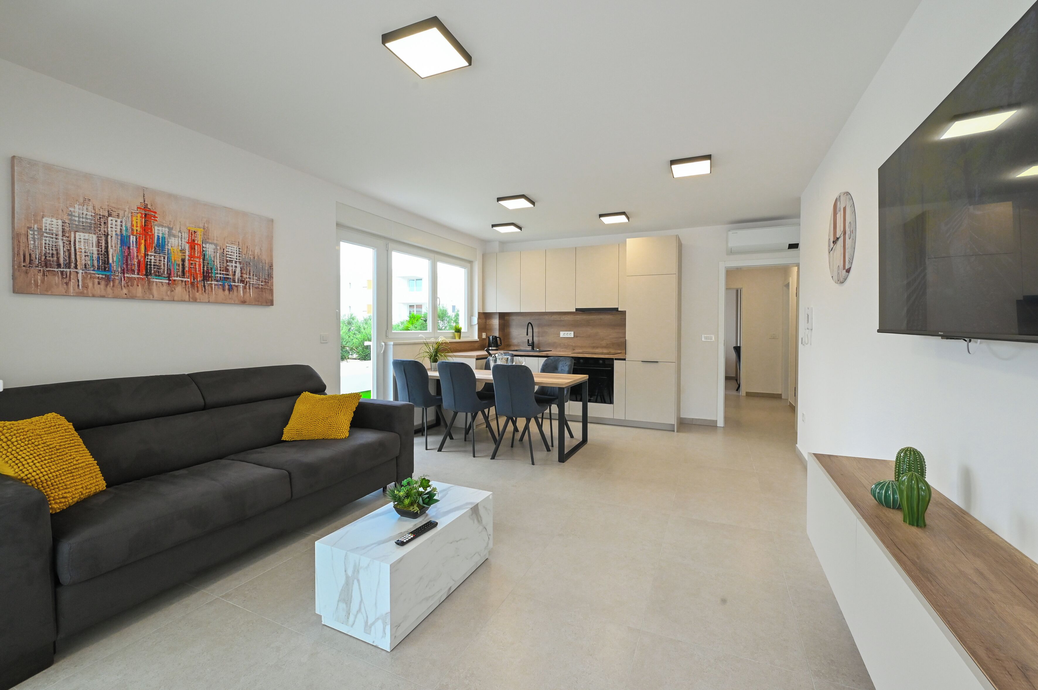 Classic Apartment, 2 Bedrooms, Poolside | Living area | 45-inch flat-screen TV with satellite channels