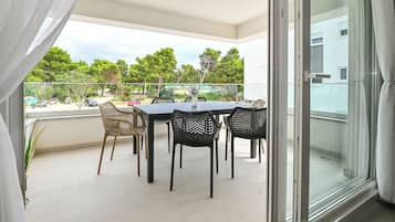 Apartment, 2 Bedrooms | Living area | Flat-screen TV