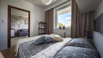 2 chambres, fer et planche à repasser, Wi-Fi, draps fournis