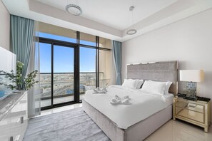 Tabla de planchar con plancha, wifi y ropa de cama