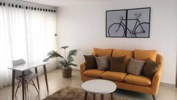 Deluxe Apartment, Balcony, City View | Living area