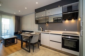 1+1 Luxury Apartment -Balcony | Living area | TV - Rusel Park Residence (Istanbul)