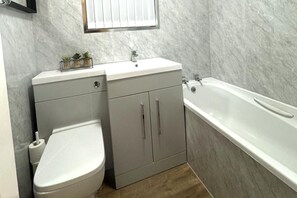 Shower, towels, toilet paper