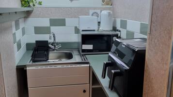 Fridge, microwave, electric kettle, toaster