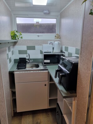 Fridge, microwave, electric kettle, toaster