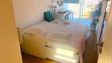 1 bedroom, desk, iron/ironing board, travel cot