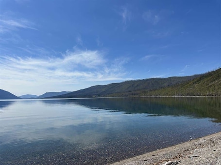 Beach. Walsh Cottage on the shores of Lake McDonald