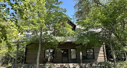 Inside Glacier National Park, West Entrance! Walsh Cottage steps to the shores