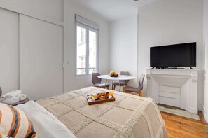 1 bedroom, desk, iron/ironing board, travel crib