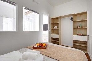 1 bedroom, desk, iron/ironing board, travel cot
