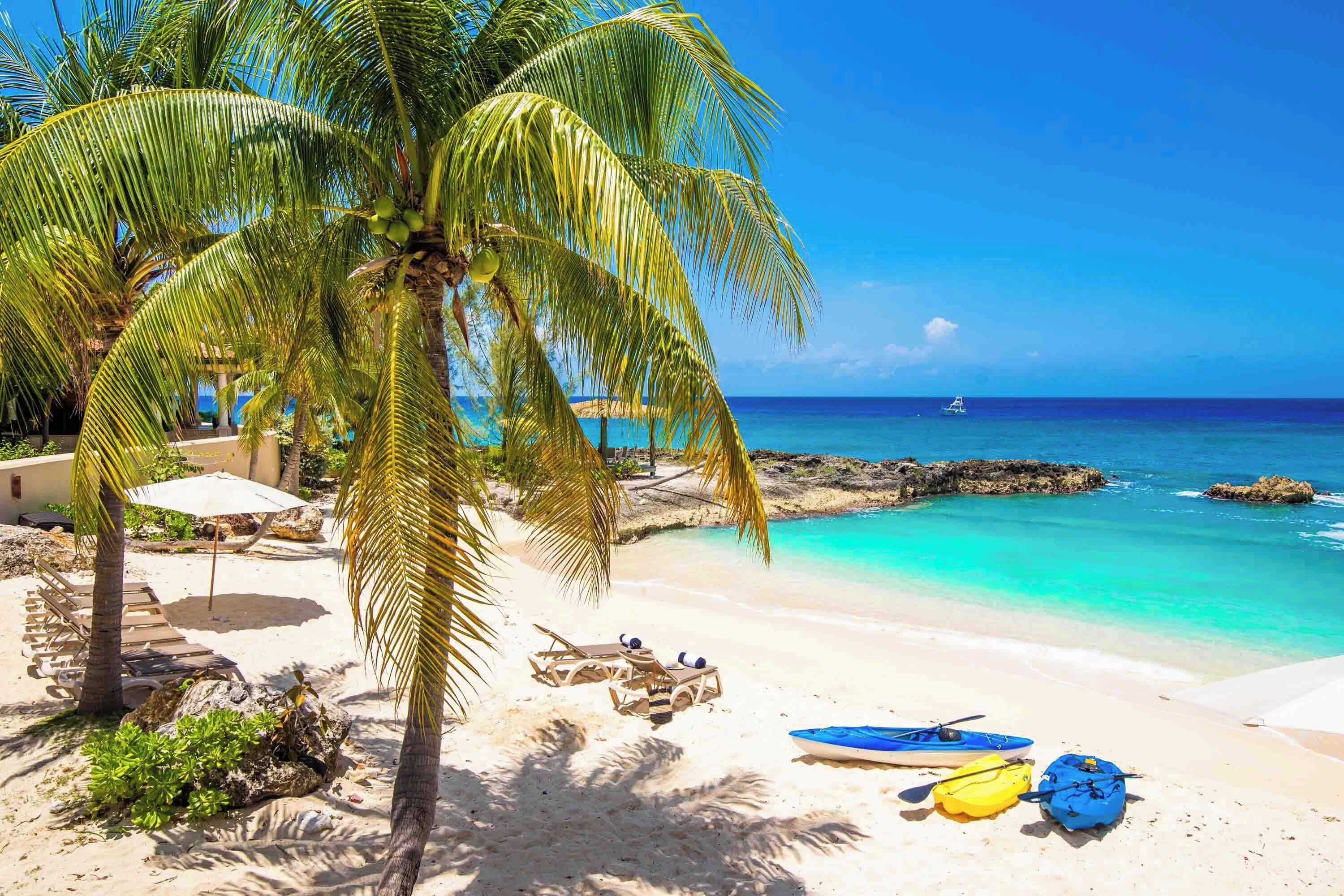 On the beach, sun loungers, beach towels