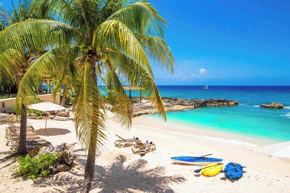 On the beach, sun-loungers, beach towels