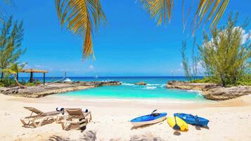 On the beach, sun-loungers, beach towels