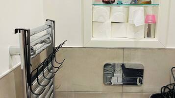 Hair dryer, towels, soap, toilet paper
