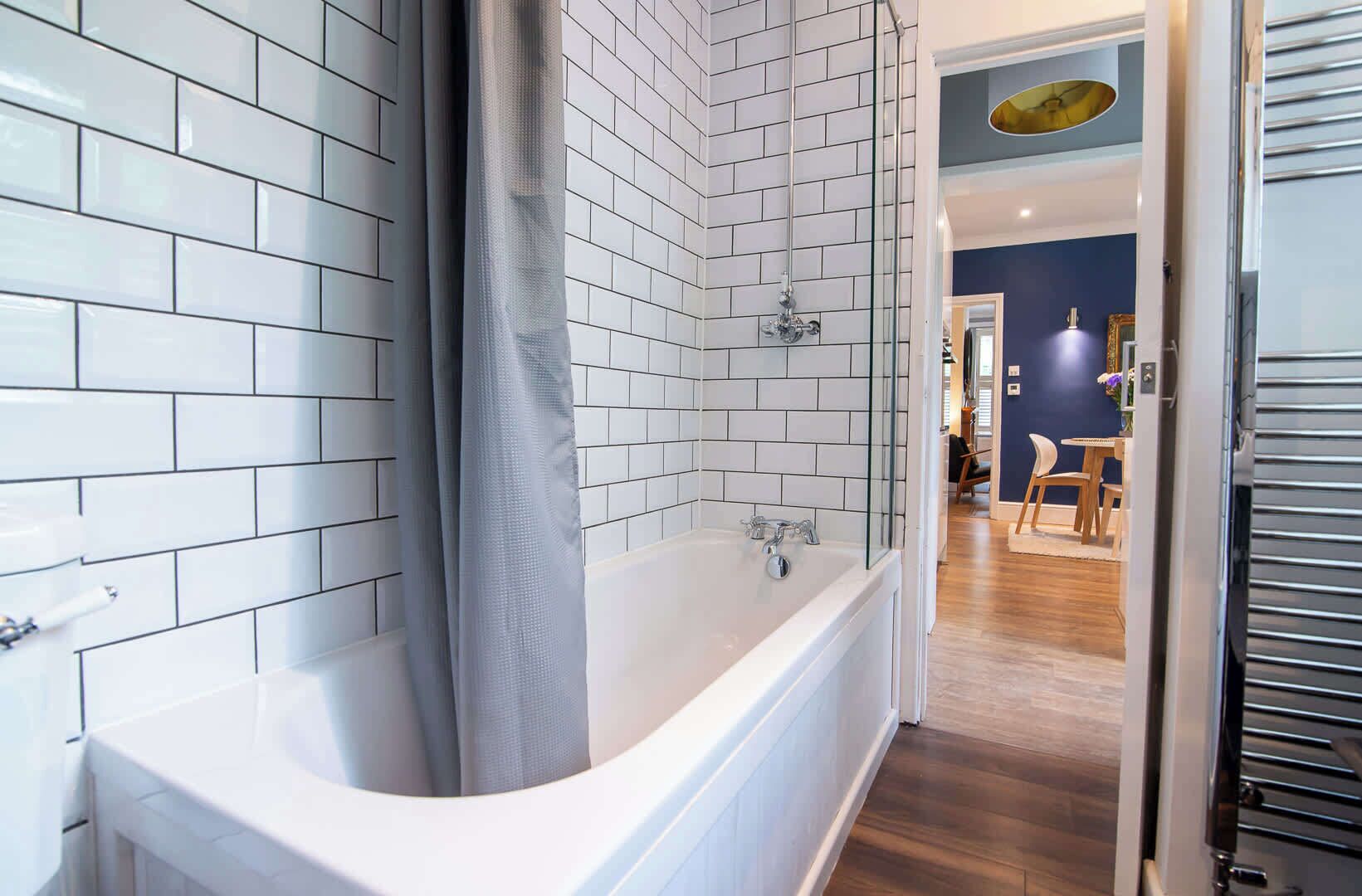 Shower, hair dryer, towels, shampoo