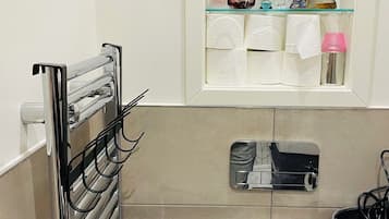 Hair dryer, towels, soap, toilet paper