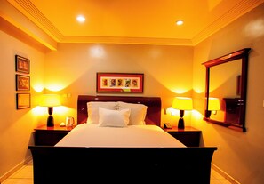 In-room safe, desk, laptop workspace, blackout drapes - Genesis Hotels (Port Harcourt)