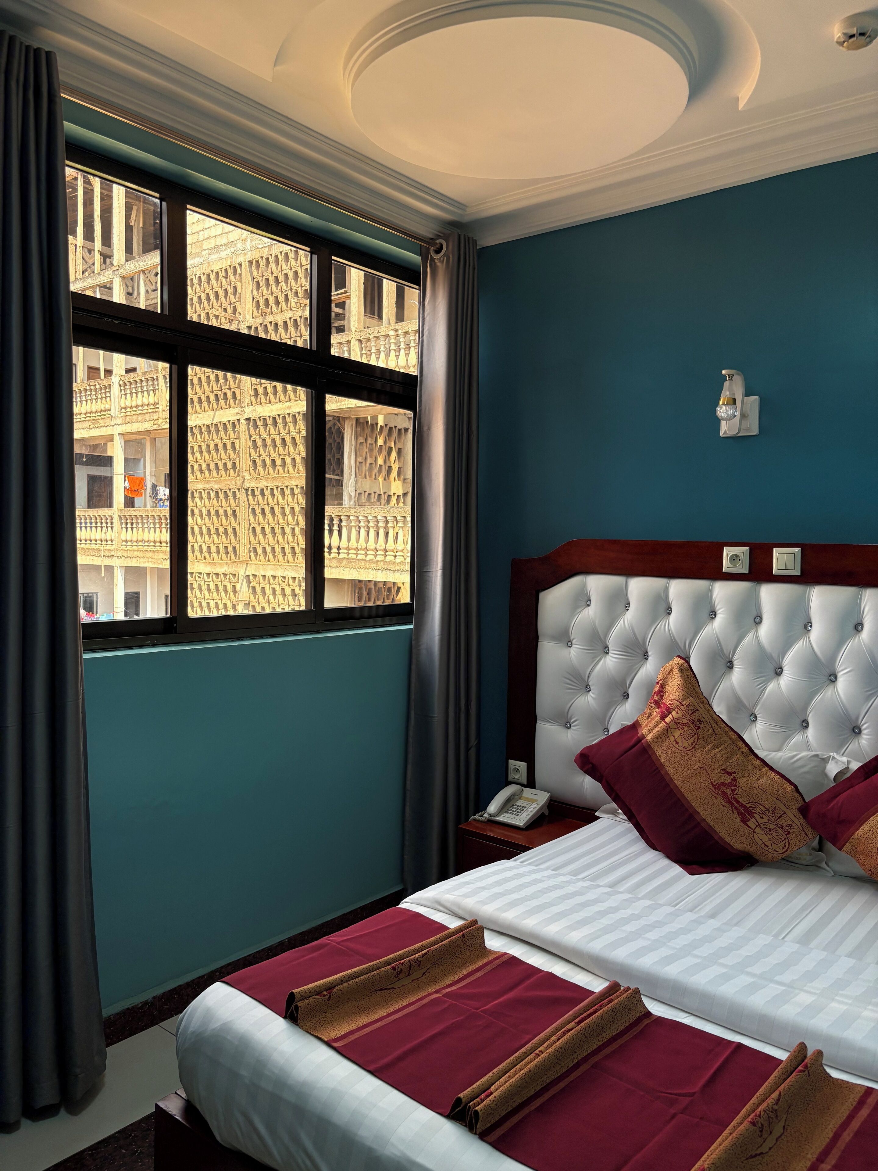 Desk, laptop workspace, blackout curtains, free WiFi