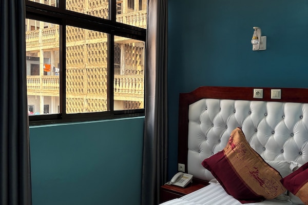 Desk, laptop workspace, blackout curtains, free WiFi