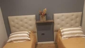 2 habitaciones, tabla de planchar con plancha, wifi y ropa de cama