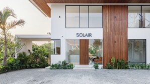 A modern building with the name 'SOLAIR' prominently displayed. - SOLAIR Pererenan Loft #9 - 1 bdr - with pool and rooftop barbeque (Badung)