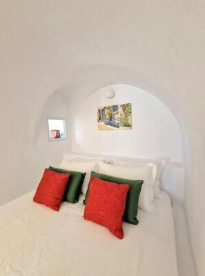 1 habitación, tabla de planchar con plancha y cuna de viaje 