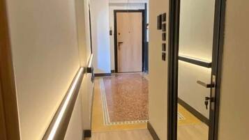 Departamento Deluxe, 2 habitaciones | Área de sala de estar