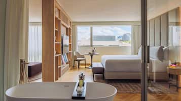 Premium bedding, down comforters, minibar, in-room safe